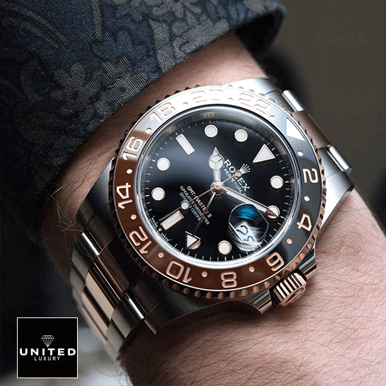 Rolex GMT-Master II Black Dial Root Beer 126711CHNR-0002 Replica On his arm